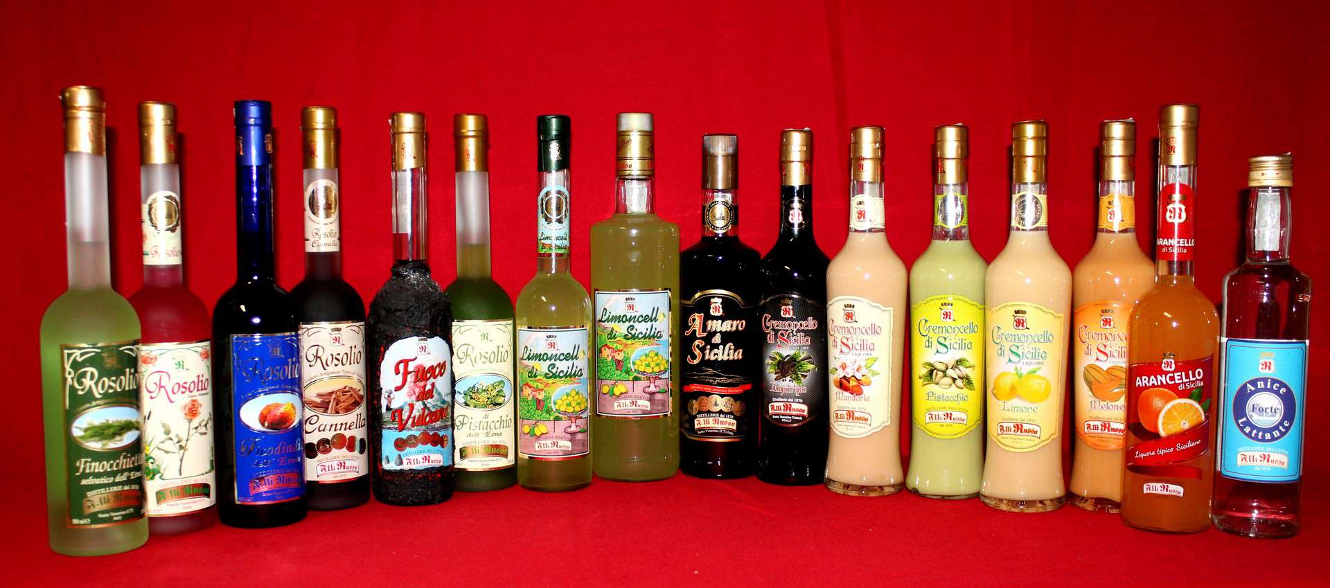 Sicilian Liqueurs The Fire of Etna and The prickly pear Liqueur.